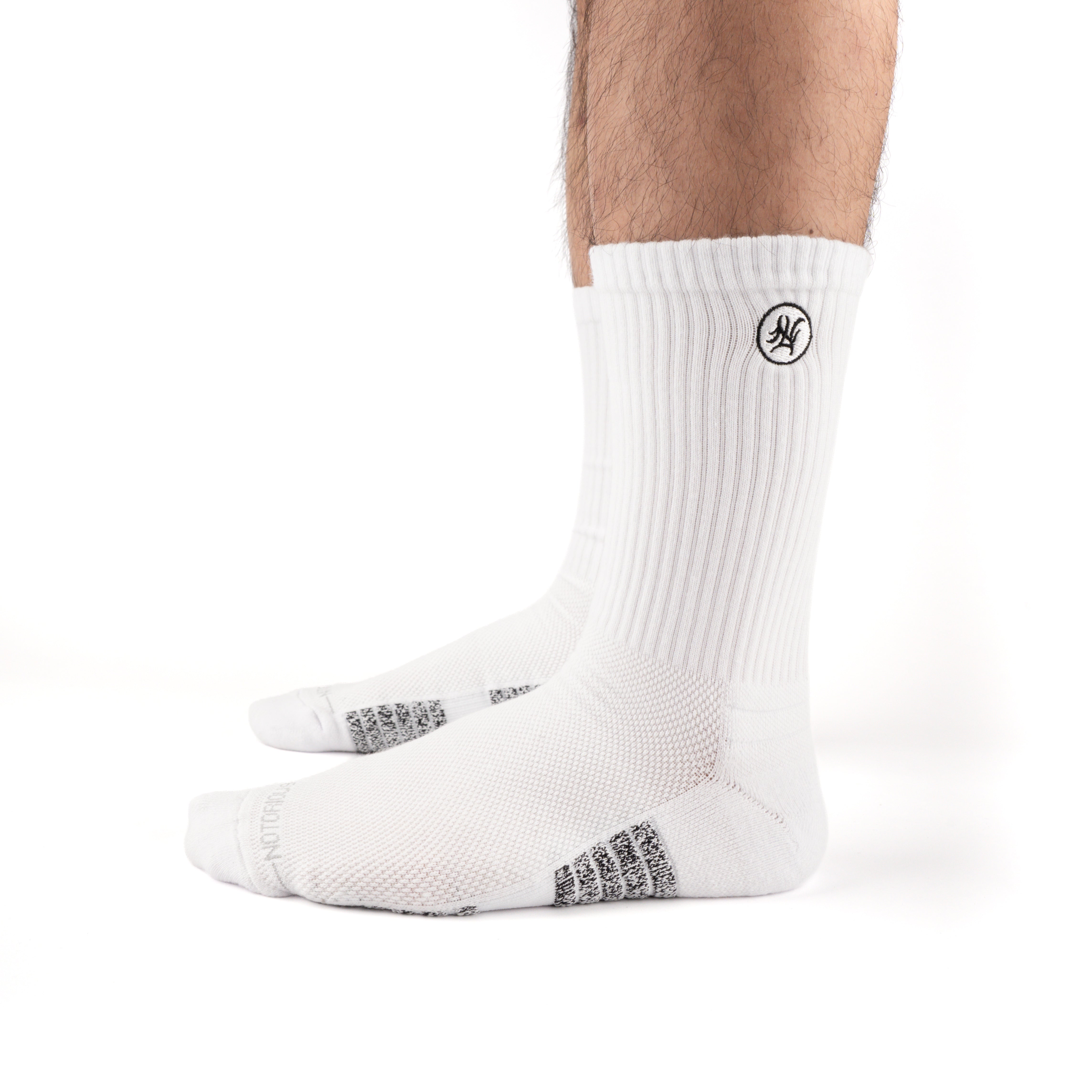 White Performance Crew Socks worn on model, side view